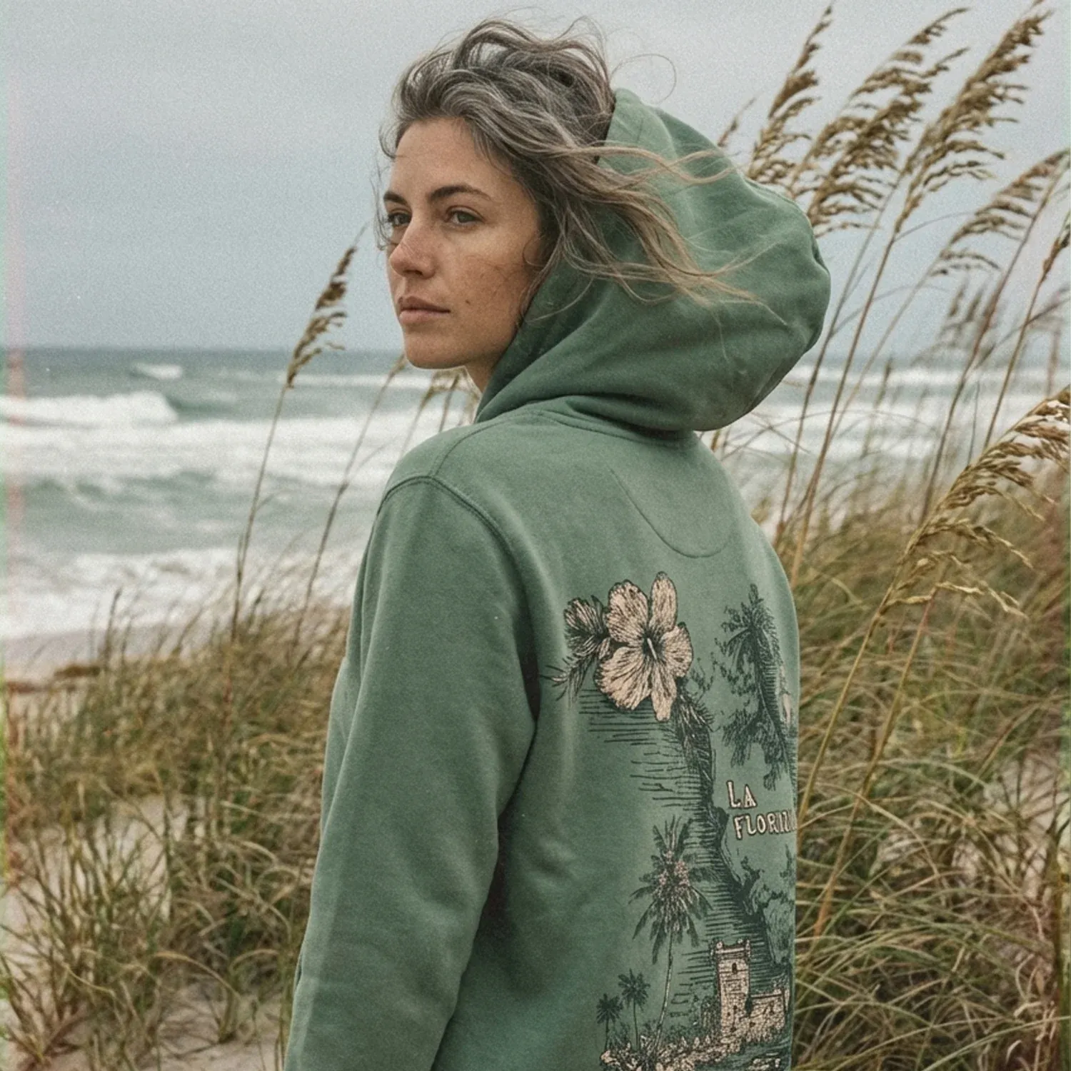Mangrove Florida hoodie photographed in beach grass
